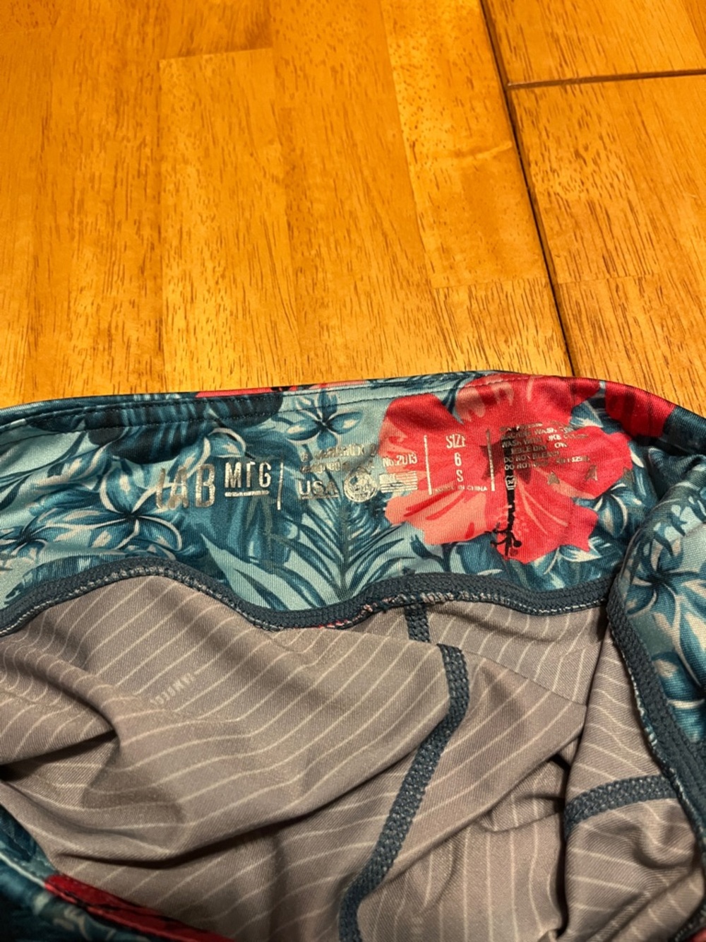High-Rise Floral Bike Shorts in Teal with Red Hibiscus - Picture 3 of 5